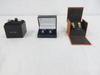 3 x Pairs of Boxed Cuff Links to Include: 1 x Paul Smith Navy & Gold Globe Cufflinks, 1 x Simon Carter Gold Racing Car Cufflinks & 1 x Unbranded Other (as viewed/pictured).