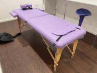 Fold Out Massage Table on Wooden Frame with Faux Purple Leather Top in Carry Case.