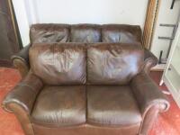3 & 2 Seater Distressed Brown Leather Sofas with Stud Detail. Size H82cm x W200cm x D94cm & H82cmx W150cm x D94cm.