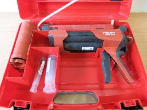 Hilti Manual Adhesive Dispenser, Model HDM 330. Comes with Operating Instructions, 2 Wire Brushes and Carry Case.