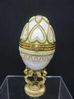 Brass Faberge Style Egg. NOTE: crack to shell.