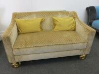 2 Seater Sofa Upholstered in Champagne Chenille Material on Kare Design Vase Mouth Gold Feet. Size H77cm x W135cm x D80cm. Comes with 2 x Gold Coloured Scatter Cushions.