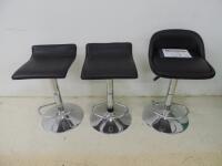 3 x Height Adjustable Stalls on Chrome Bases with Black Faux Leather Seats.
