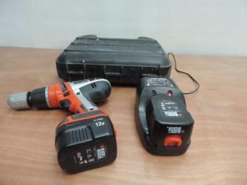 Black & Decker Cordless Hammer Drill. Comes with 1 x Drill, Model HP128F3, 1 x 12v Battery Pack Charger, 2 x 12 v Batteries, Model A1712 & Carry Case.