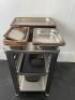 Stainless Steel Table with 8 Tray Slot Under, Size H80cm x W48cm x D63cm. Comes with an Assorted lot of Trays & Tins (As Viewed/Pictured). - 4