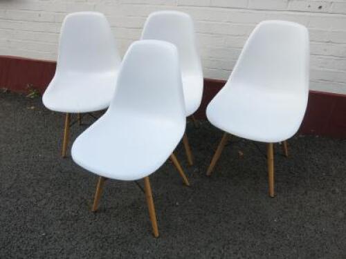 4 x Eames Style Chairs in White with Light Wood Legs.