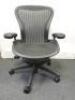 Herman Miller Aeron Ergonomic Adjustable Mesh Office Chair in Graphite Grey with Adjustable Arm Rests & Leather Padded Arm Caps, Size B.