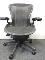 Herman Miller Aeron Ergonomic Adjustable Mesh Office Chair in Graphite Grey with Adjustable Arm Rests & Leather Padded Arm Caps, Size B.