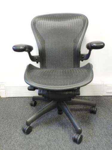 Herman Miller Aeron Ergonomic Adjustable Mesh Office Chair in Graphite Grey with Adjustable Arm Rests & Leather Padded Arm Caps, Size B.