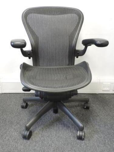 Herman Miller Aeron Ergonomic Adjustable Mesh Office Chair in Graphite Grey with Adjustable Arm Rests & Leather Padded Arm Caps, Size B.