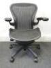 Herman Miller Aeron Ergonomic Adjustable Mesh Office Chair in Graphite Grey with Adjustable Arm Rests & Leather Padded Arm Caps, Size B.