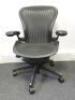 Herman Miller Aeron Ergonomic Adjustable Mesh Office Chair in Graphite Grey with Adjustable Arm Rests & Leather Padded Arm Caps, Size B.