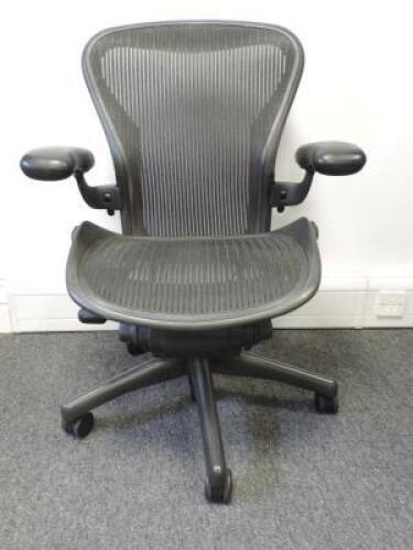Herman Miller Aeron Ergonomic Adjustable Mesh Office Chair in Graphite Grey with Adjustable Arm Rests & Leather Padded Arm Caps, Size B.