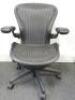 Herman Miller Aeron Ergonomic Adjustable Mesh Office Chair in Graphite Grey with Adjustable Arm Rests & Leather Padded Arm Caps, Size B.