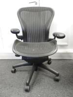 Herman Miller Aeron Ergonomic Adjustable Mesh Office Chair in Graphite Grey with Adjustable Arm Rests & Leather Padded Arm Caps, Size B.