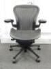 Herman Miller Aeron Ergonomic Adjustable Mesh Office Chair in Graphite Grey with Adjustable Arm Rests & Leather Padded Arm Caps, Size B.