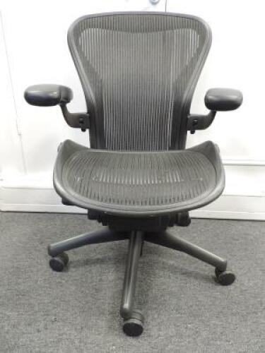 Herman Miller Aeron Ergonomic Adjustable Mesh Office Chair in Graphite Grey with Adjustable Arm Rests & Leather Padded Arm Caps, Size B.