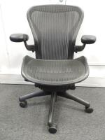 Herman Miller Aeron Ergonomic Adjustable Mesh Office Chair in Graphite Grey with Adjustable Arm Rests & Leather Padded Arm Caps, Size B.