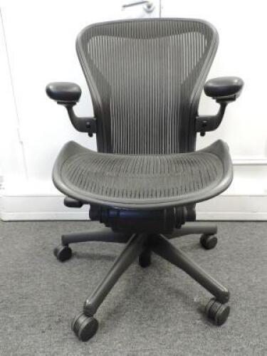 Herman Miller Aeron Ergonomic Adjustable Mesh Office Chair in Graphite Grey with Adjustable Arm Rests & Leather Padded Arm Caps, Size B.