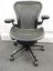 Herman Miller Aeron Ergonomic Adjustable Mesh Office Chair in Graphite Grey with Adjustable Arm Rests & Leather Padded Arm Caps, Size B.