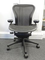 Herman Miller Aeron Ergonomic Adjustable Mesh Office Chair in Graphite Grey with Adjustable Arm Rests & Leather Padded Arm Caps, Size B.