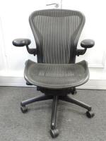 Herman Miller Aeron Ergonomic Adjustable Mesh Office Chair in Graphite Grey with Adjustable Arm Rests & Leather Padded Arm Caps, Size B.