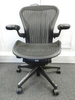 Herman Miller Aeron Ergonomic Adjustable Mesh Office Chair in Graphite Grey with Adjustable Arm Rests & Leather Padded Arm Caps, Size B.