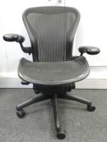 Herman Miller Aeron Ergonomic Adjustable Mesh Office Chair in Graphite Grey with Adjustable Arm Rests & Leather Padded Arm Caps, Size B.