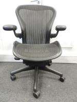 Herman Miller Aeron Ergonomic Adjustable Mesh Office Chair in Graphite Grey with Adjustable Arm Rests & Leather Padded Arm Caps, Size B.