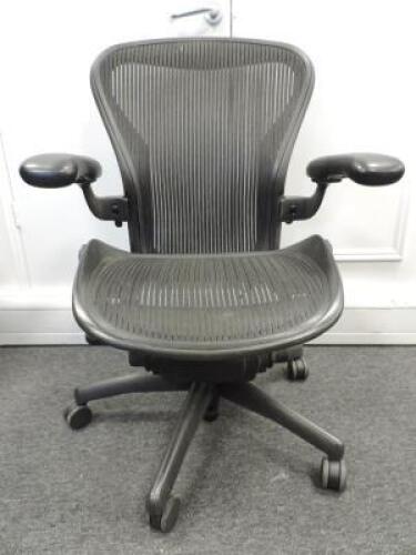 Herman Miller Aeron Ergonomic Adjustable Mesh Office Chair in Graphite Grey with Adjustable Arm Rests & Leather Padded Arm Caps, Size B.