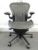 Herman Miller Aeron Ergonomic Adjustable Mesh Office Chair in Graphite Grey with Adjustable Arm Rests & Leather Padded Arm Caps, Size B.