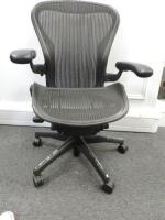 Herman Miller Aeron Ergonomic Adjustable Mesh Office Chair in Graphite Grey with Adjustable Arm Rests & Leather Padded Arm Caps, Size B.