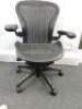 Herman Miller Aeron Ergonomic Adjustable Mesh Office Chair in Graphite Grey with Adjustable Arm Rests & Leather Padded Arm Caps, Size B.