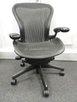 Herman Miller Aeron Ergonomic Adjustable Mesh Office Chair in Graphite Grey with Adjustable Arm Rests & Leather Padded Arm Caps, Size B. NOTE: requires bolt to seat frame (As Viewed/Pictured).