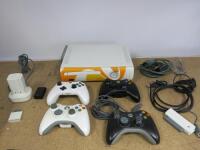 XBOX 360 Console 120GB HDD. Comes with 4 Assorted Hand Controllers, Battery Charger & Associated Leads. NOTE: missing power lead.