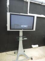 LG 42" XD Engine TV, Model RZ42PX11. Comes with Remote and Unicol Oxford Mobile TV Stand with Glass Shelf.