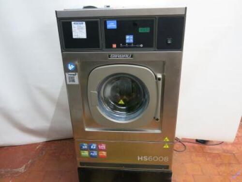 Girbau Commercial High Spin Speed Washing Machine,Capacity 9kg, Spin Speed 1000rpm, Model HS-6008-LC-E, S/N 2099427.Size H108cm x W69cm x D68cm.Washing Machine mounted on Metal Stand, Total Height 128cm.