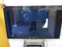 Panasonic 42" LCD TV, Model TX-L42E5B. Comes with Part Wall Bracket. NOTE: TV sold for spares or repair (As Viewed/Pictured).