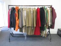 Clothes Rail of Ladies & Gentlemens Winter Coats in Assorted Sizes & Styles to Include: 26 x Ladies Coats & 8 x Gentlemens Coats.Comes with Metal Mobile Clothes Rail (As Viewed/Pictured).