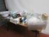 Large Quantity of Commercial & Domestic Kitchen Accessories to Include:Qty of White Crockery & Plastic Rice Bowls, 2 x Plastic Trays, 3 x Large Plastic Mixing Bowls,9 x Assorted Sized Metal Serving Trays, 2 x Mechline Grease Paks, 4 x Assorted Baking Tool - 2