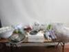 Large Quantity of Commercial & Domestic Kitchen Accessories to Include:Qty of White Crockery & Plastic Rice Bowls, 2 x Plastic Trays, 3 x Large Plastic Mixing Bowls,9 x Assorted Sized Metal Serving Trays, 2 x Mechline Grease Paks, 4 x Assorted Baking Tool - 19