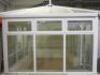 Ex-Display Clip On, Dwarf Wall, UPVC Double Glazed Conservatory with Double Door, 9 Windows & Glazed/Polycarbonate Roof. Size H275cm x W275cm x D320cm. NOTE: missing door & window furniture & guttering (As Viewed/Pictured) & Requires Dismantling by Buyer. - 3