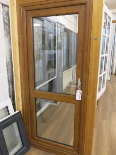 Ex Display UVPC Double Glazed 2 Panel Back Door with Frame in Oak Effect. Size H199cm x W88cm. NOTE: missing lock.