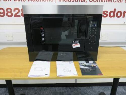 AEG Model MBE2658SEM Touch Control Integral 900w Microwave Oven with Advanced Ventilation. New/Unused Ex Showroom Display. Comes with User Manuals. RRP £509.