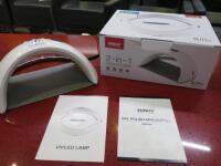 Sunluv 2 in LED/UV Nail Lamp. In original Box with Power Supply User Manual.