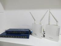 2 x Netgear ProSafe POE Switches, Models FS108P & FS116P with 2 x DrayTek Vigor 810 Routers.