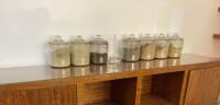 7 x Glass Jars with Lids Containing Mixture of Colourants.