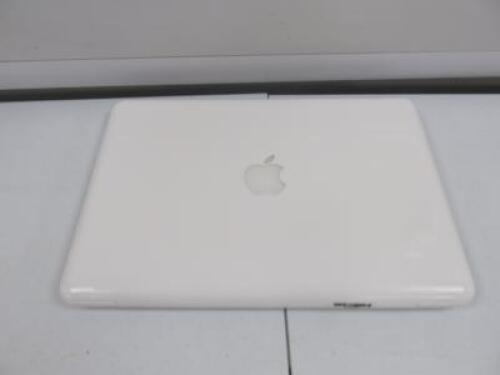 Apple 13" MacBook, Model A1342. 250GB HDD (Formated No OS). NOTE: requires power supply.