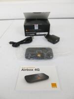 Orange Airbox 4G. Comes with Cables (As Viewed/Pictured).