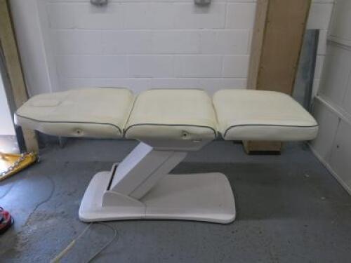 REM Excel Electric 3 Motor Beauticians Adjustable Treatment Chair/Couch Upholstered in White Vinyl and Comes with Controller, S/N 000184. NOTE: condition as viewed/pictured.